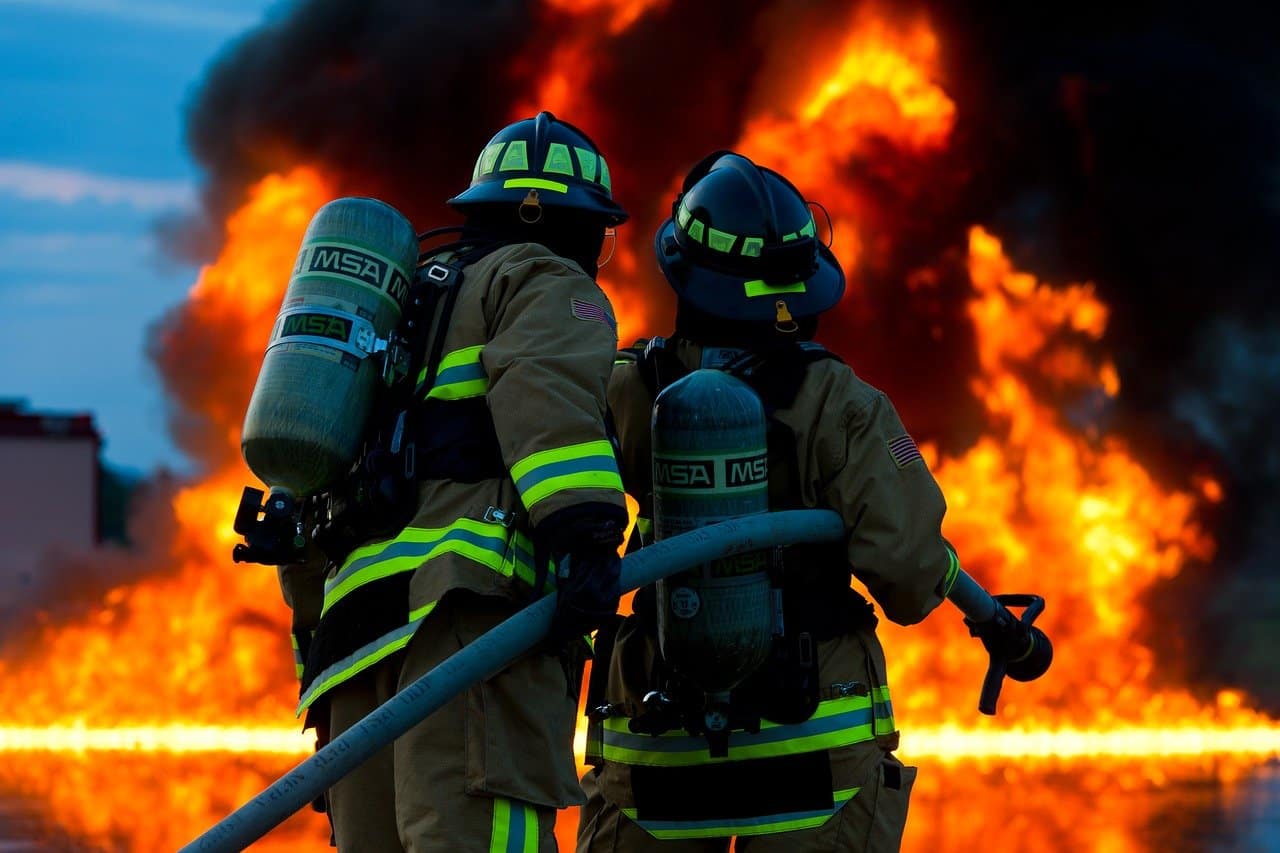 fire fighters extinguishing fire