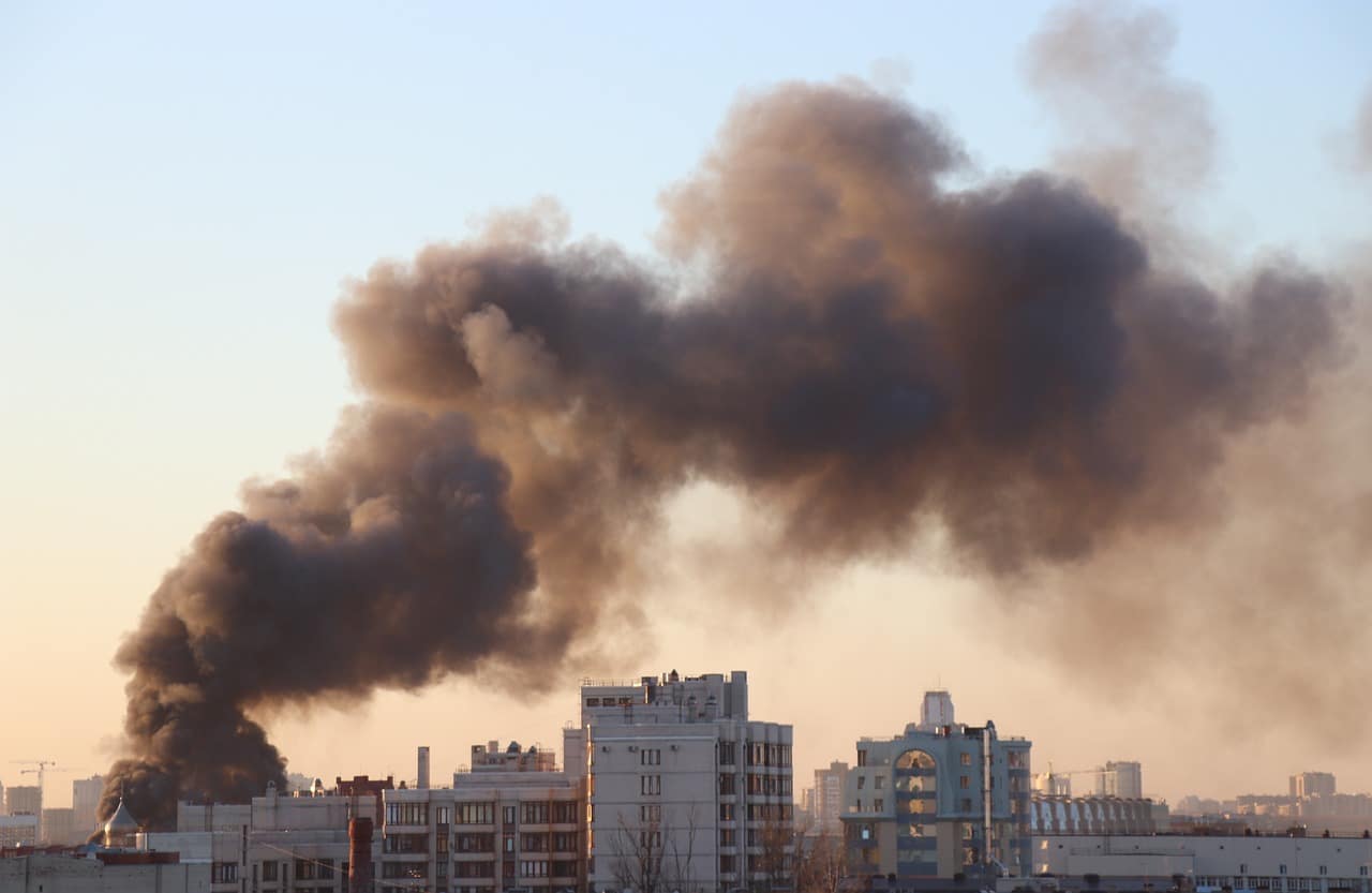 smoke from building fire cityscape